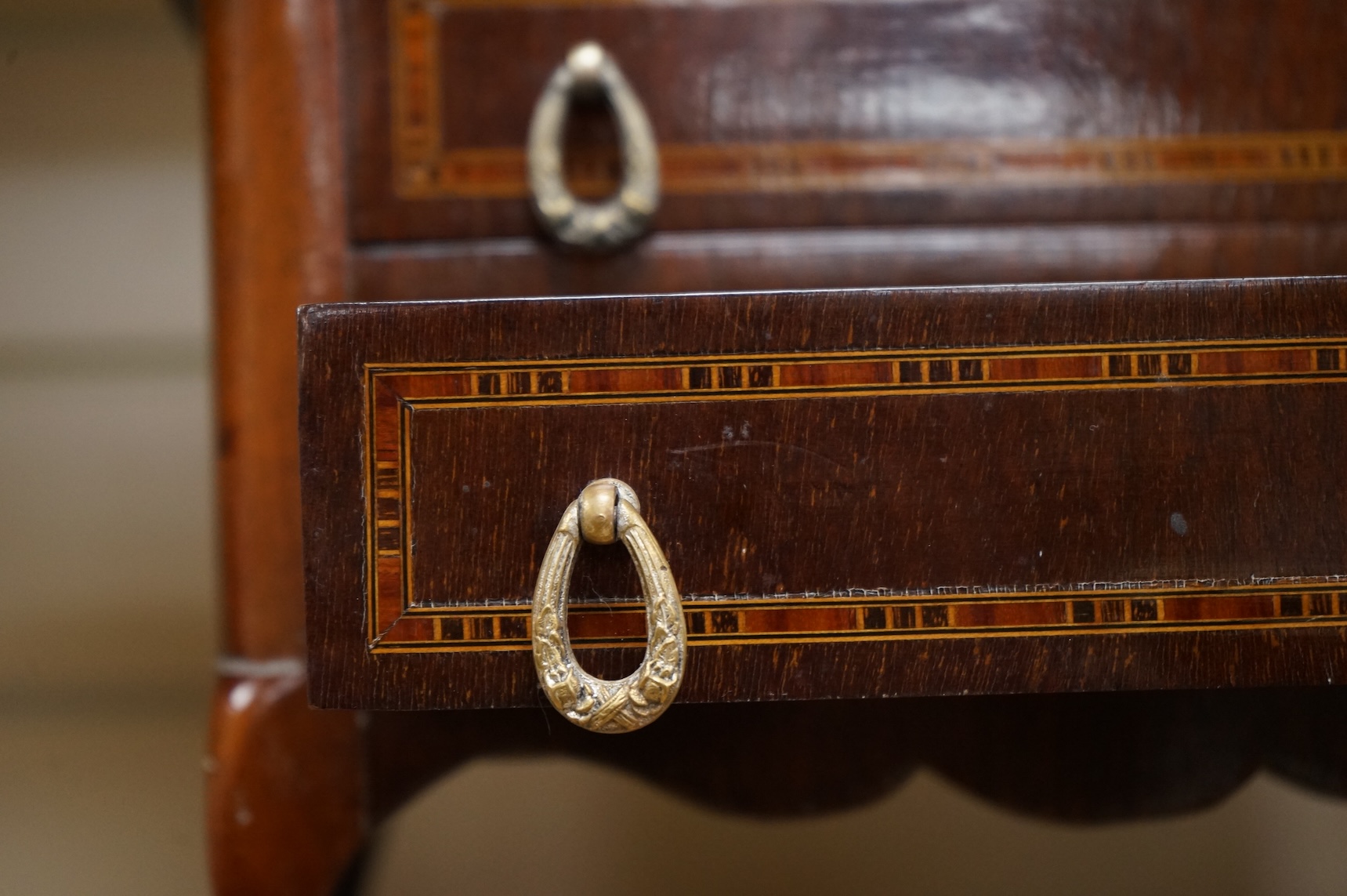 A French miniature lined inlaid mahogany chest of two drawers, 29cm wide